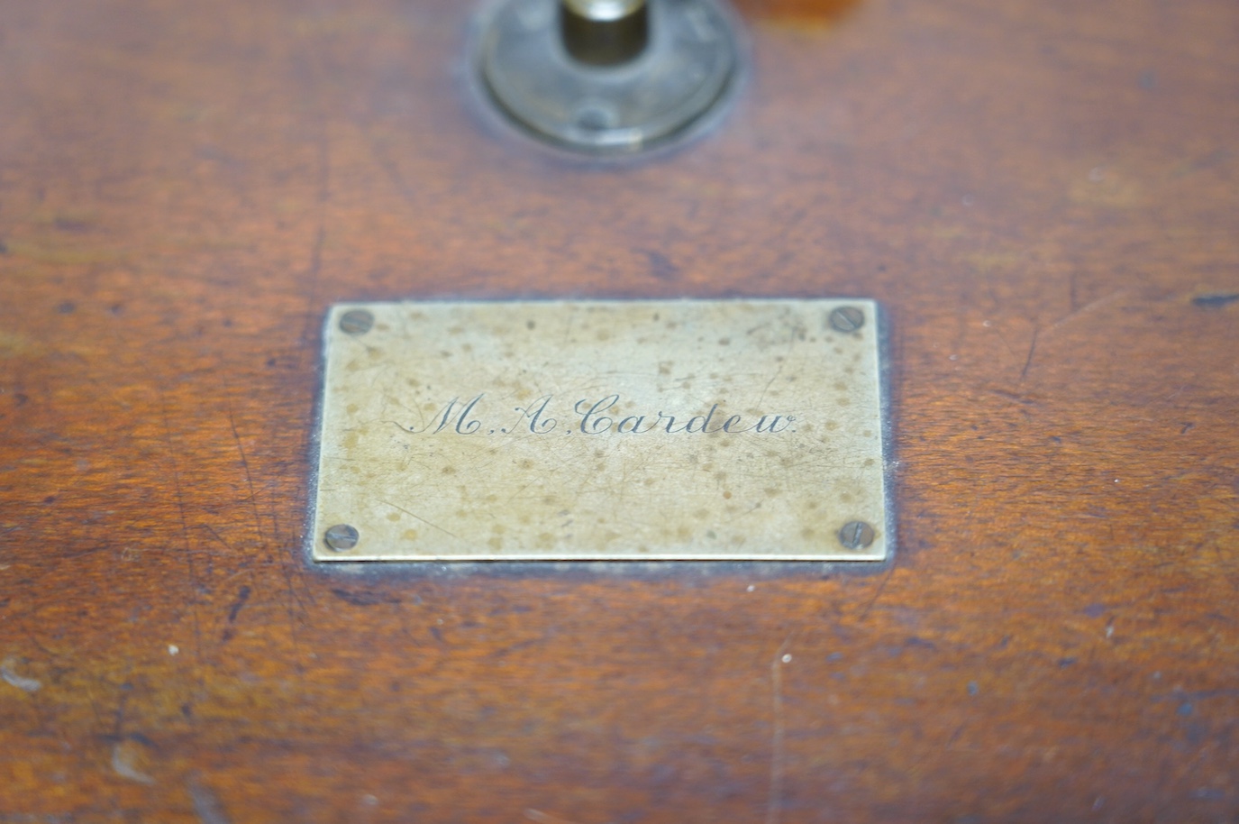 A late 19th/early 20th century Willcox & Gibbs swan neck sewing machine, with its original mahogany case, engraved brass owners label to top of case. Condition - fair to good